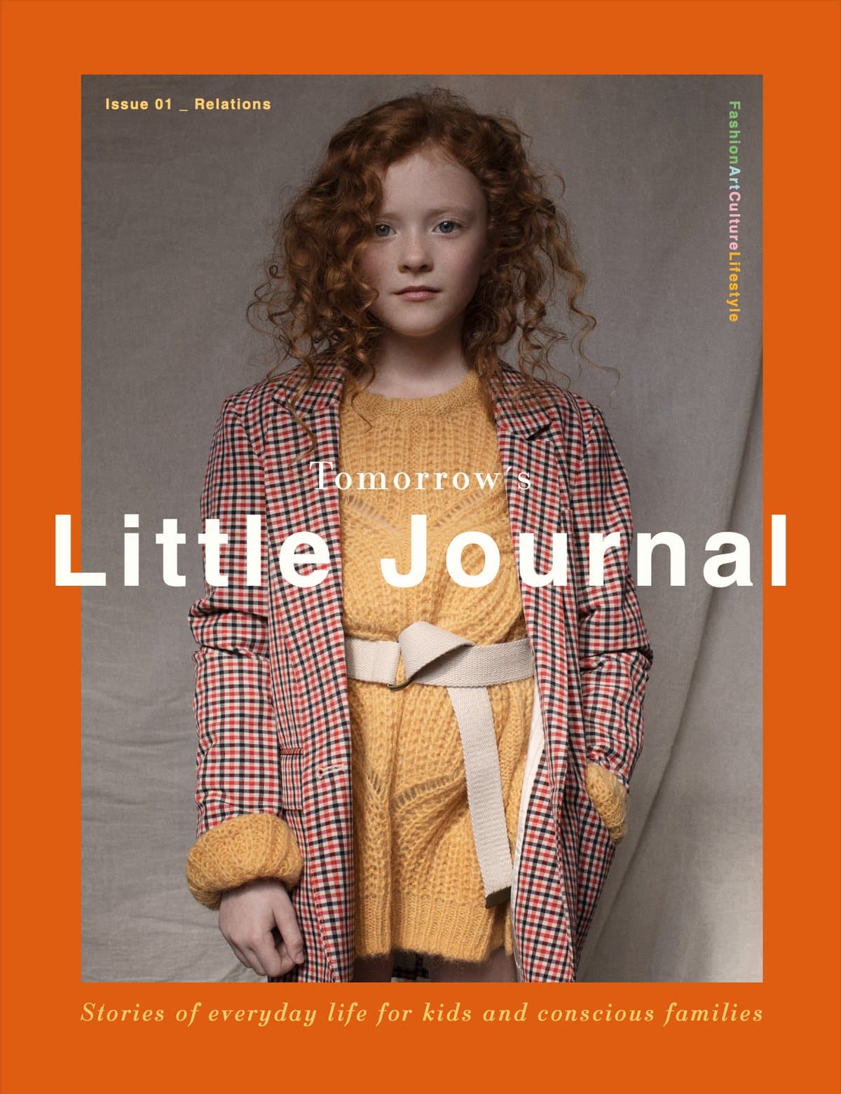Tomorrow’s Little Journal issue 1 cover: a red-haired girl in a checked jacket on an orange background